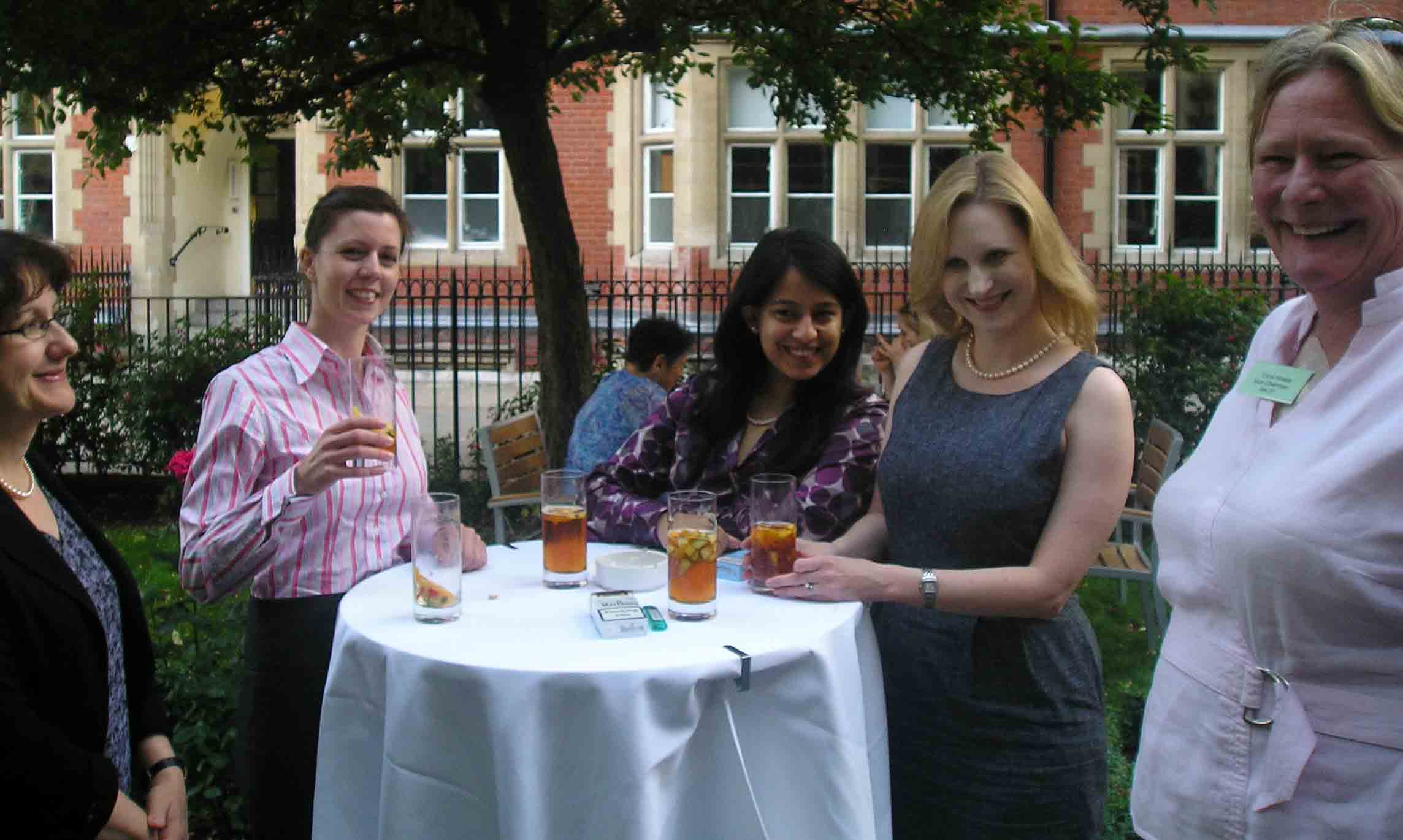 BACFI Vice President Tricia Howse, CBE, with guests Wafa Shah and Tamsin Xerxes, enjoy their Pimms with Sara George and Christa Richmond of Middle Temple.