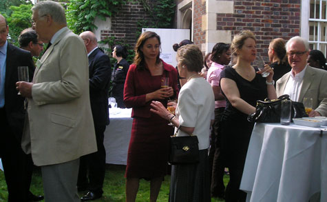 BACFI Treasurer Helen Fletcher Rogers with members and guests enjoying the Rose Garden.