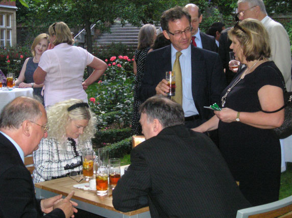 Lucy Boyd apparently attempting to flog Lipson Lloyd Jones pens to Robert Stevenson of the Franco British Lawyers' Society...